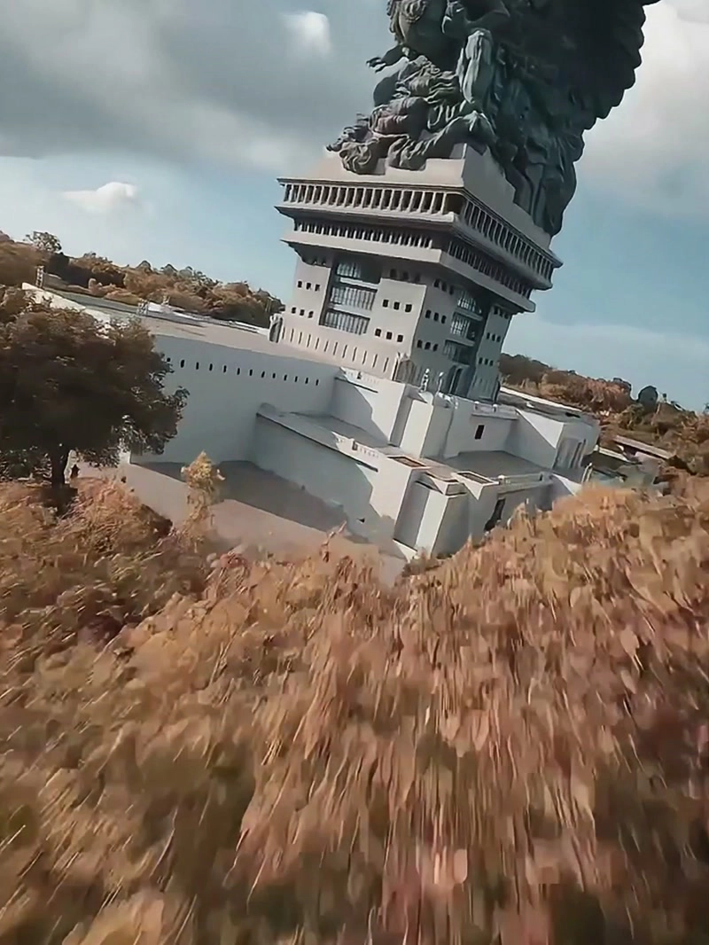 Spectacular circular flight around giant statues